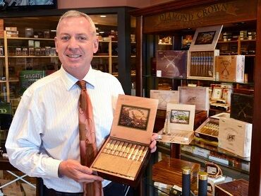 Davidus owner showing his cigars