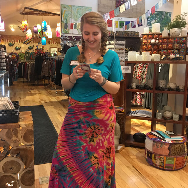 Woman in dress inside boho store