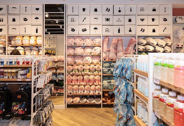 Inside a Miniso UK store. Shelves of stuffed animals