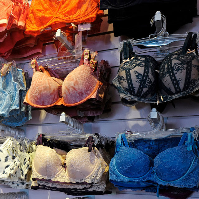 Bright colored bras with intricate patterning and lace