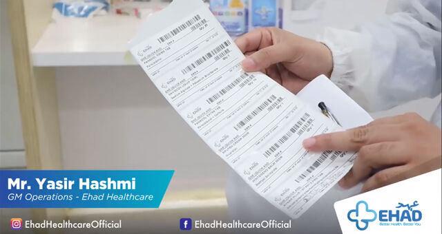 Ehad employee showing barcodes