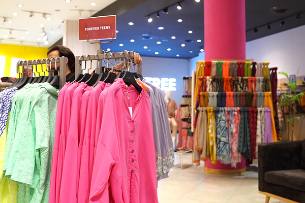 Racks of colorful clothes at HKB
