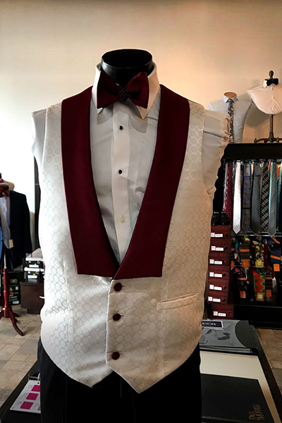 Vest and dress shirt on a mannequin at a Miguel's Formal Wear store
