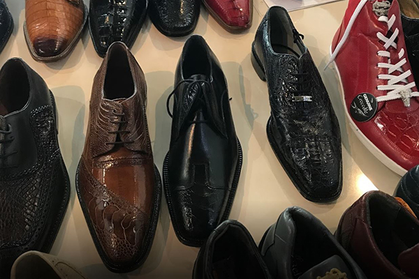 Men's dress shoes on display at a Miquel's Formal Wear Store