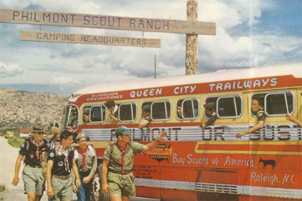 Boy scouts entering bus at Philmont Scout Ranch