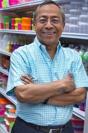 Customer in front of kitchen goods inside Tienda Morena