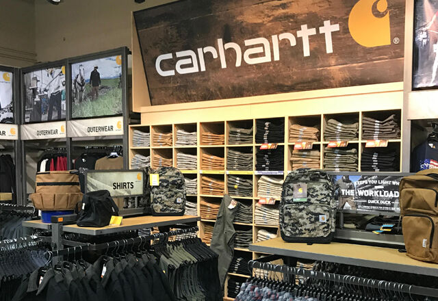 Arc Thrift mascot with young customer