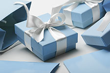 giftboxes wrapped elegantly with a bow